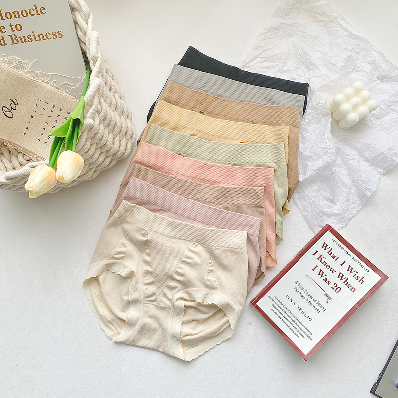 N8047 Belly tightening and hip lifting 3D peach butt seamless women's mid-waist underwear simple briefs 2021 autumn and winter new style