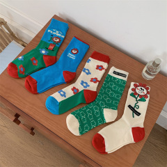 Spring and summer designer creative cartoon illustration flower girl socks three-dimensional flower mid-tube embroidered letters couple socks
