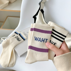 Trendy socks jacquard letters white socks women's mid-calf cotton socks Japanese small white socks casual sports couple socks