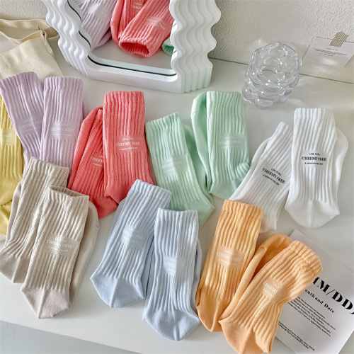 Spring and summer new style candy-colored small fresh solid color loose ruffled casual women's mid-calf socks individually packaged