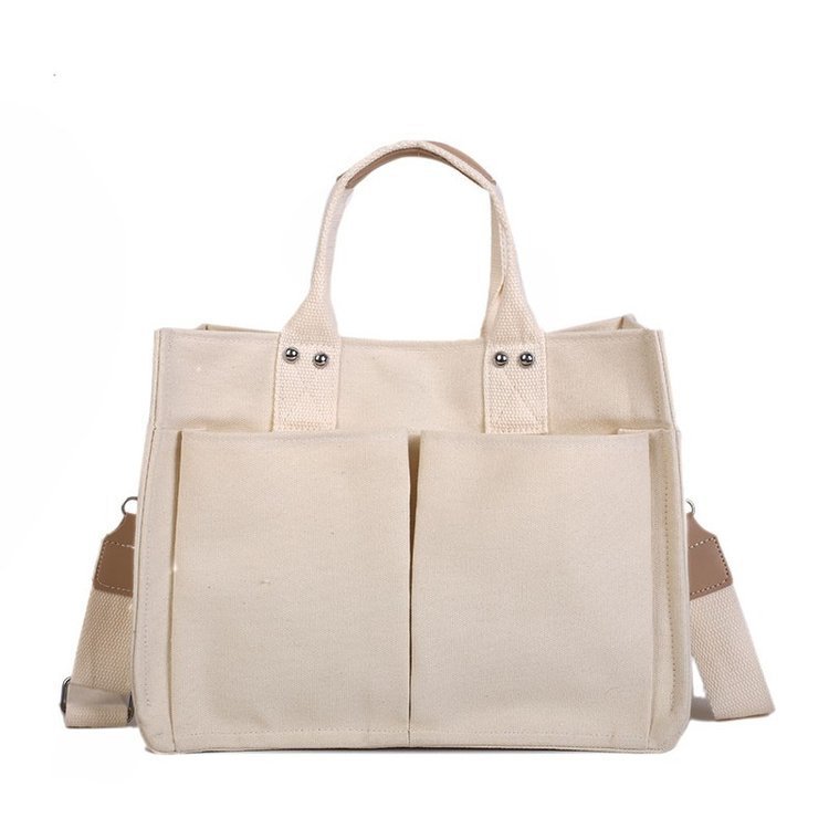 Fashionable new large-capacity casual canvas bag with multiple pockets, practical shoulder bag, hand-held crossbody bag, large bag for women
