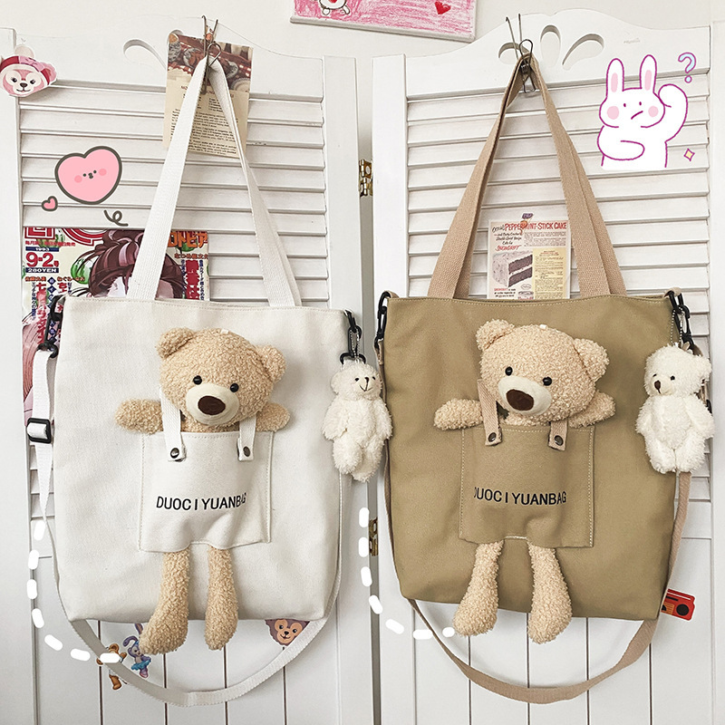 Cute doll bag for women, versatile new Japanese style funny personality bear doll soft girl student canvas messenger bag