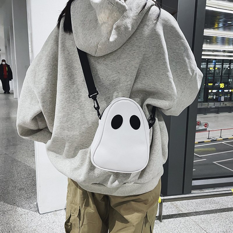 Foreign trade new European and American fashion funny personality interesting cute devil ghost contrasting color stitching women's trendy PU small bag
