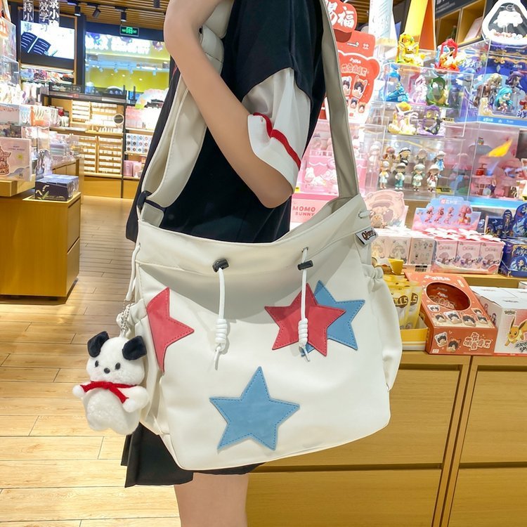 Large-capacity star canvas bag female college student class commuting bag ins Japanese style versatile forest style single shoulder messenger bag