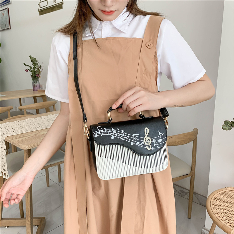 Foreign trade new European and American fashion sweet lady personality note organ female trendy crossbody bag contrasting color small bag
