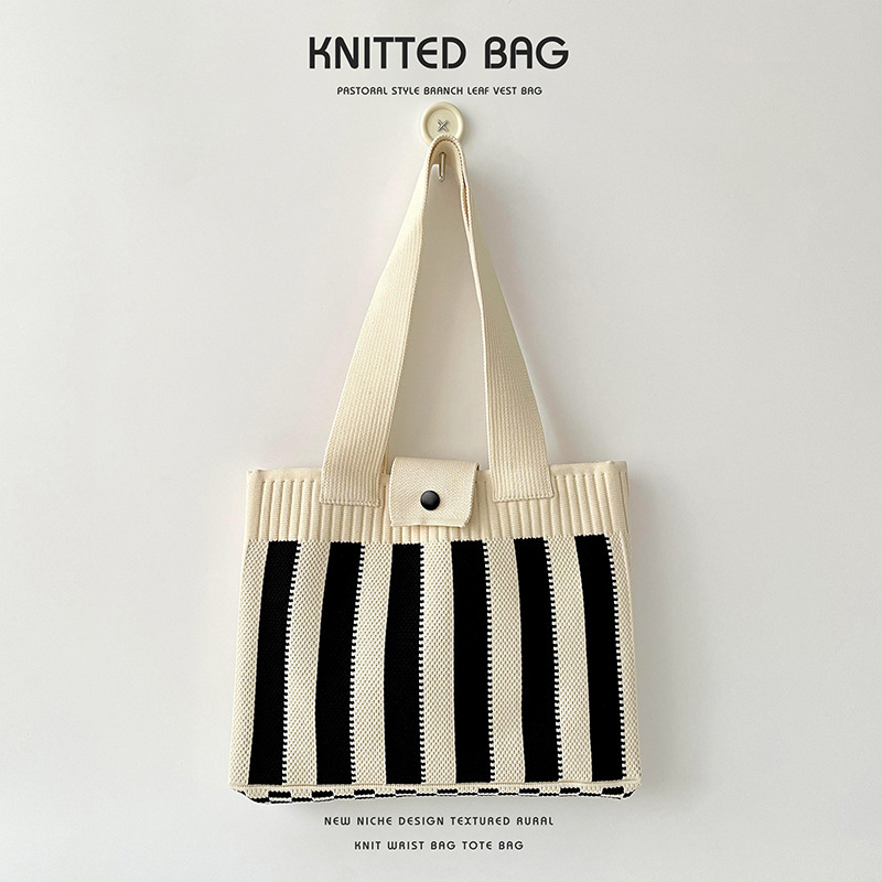 Niche design black and white vertical striped knitted shoulder handbag student large capacity tote bag