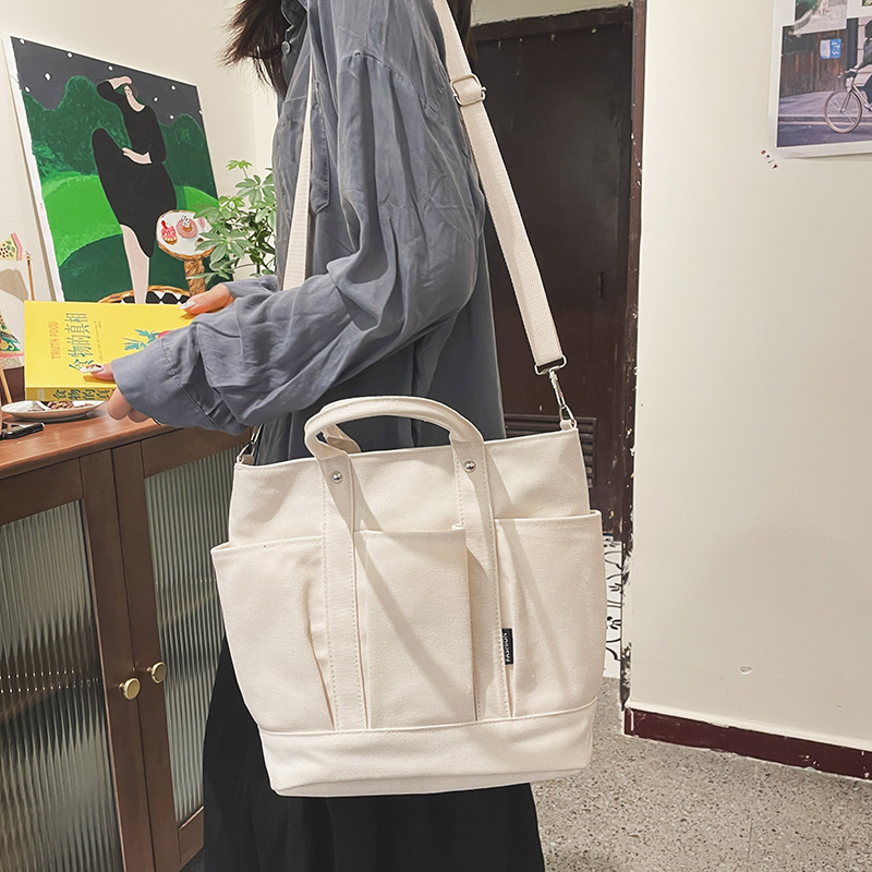 Japanese ins Harajuku retro literary versatile casual large capacity girl student solid color canvas hand-held crossbody bag
