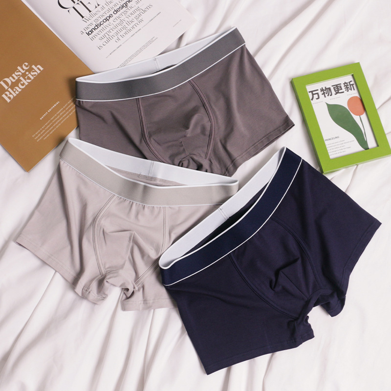 There are 4XL pure cotton men's underwear, mid-waist boxer briefs, loose large size, young and middle-aged men's boxer shorts.