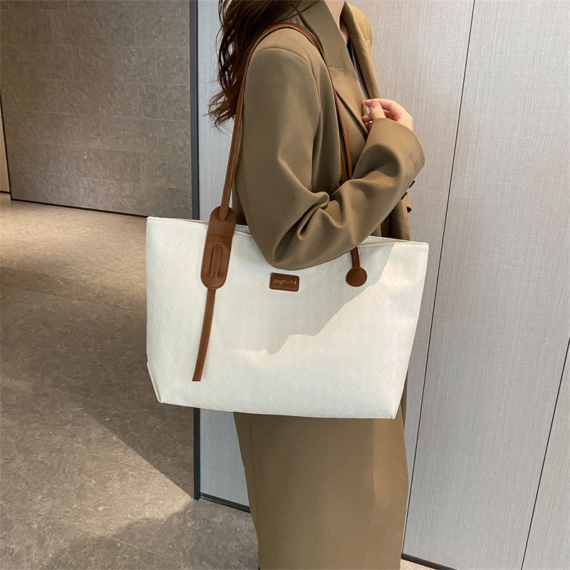 Casual large-capacity bag women's bag 2024 spring and summer new versatile canvas bag commuter shoulder bag simple tote bag