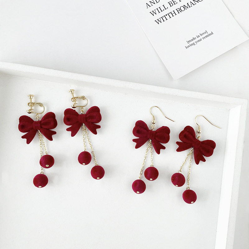Autumn and winter new red flocked ear hooks with bows, ball tassels, New Year's and Christmas versatile atmosphere earrings and ear clips