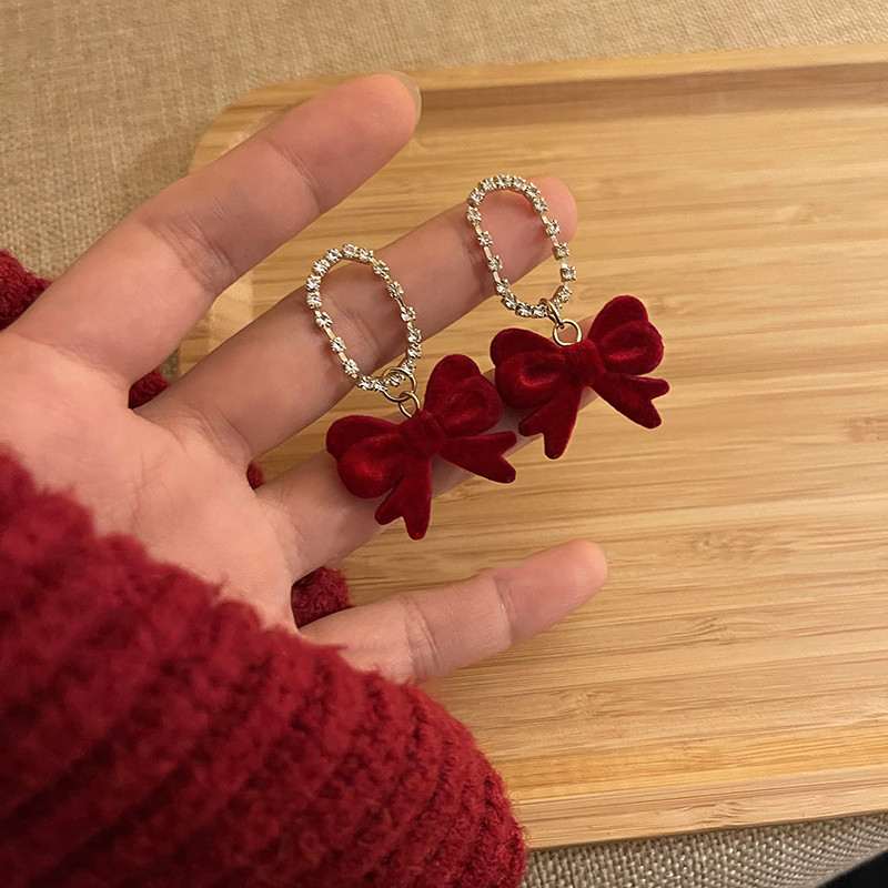 Autumn and winter flocked bow red earrings for women, new style, trendy, suitable for New Year earrings, temperament, New Year's earrings