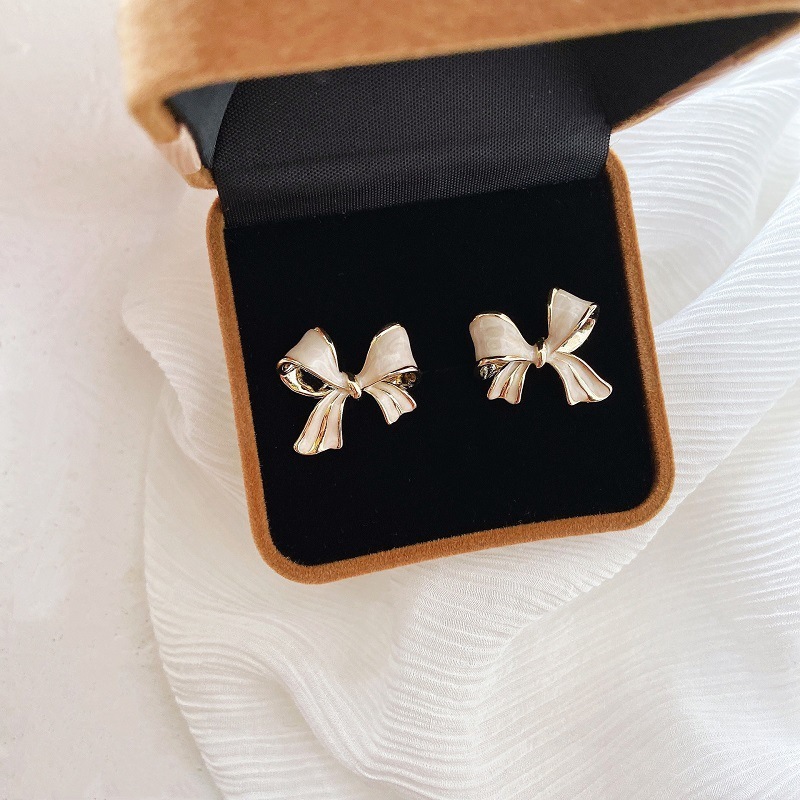 New French retro pure desire cream white bow new earrings earrings trendy niche
