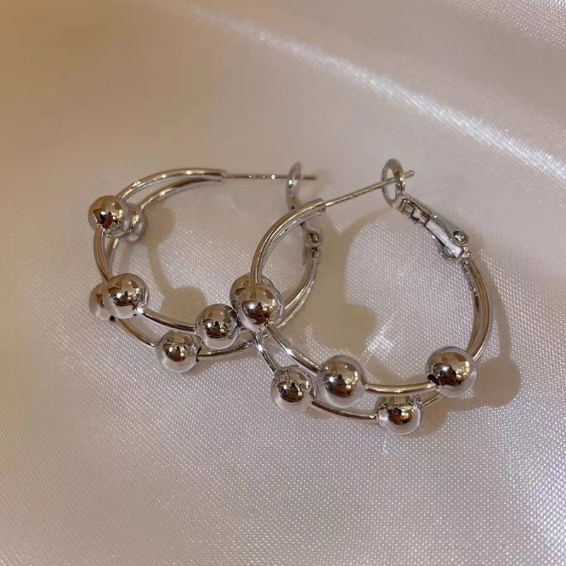 Exaggerated personality trend small ball earrings earrings for women Japanese and Korean new versatile light luxury niche high-end design earrings