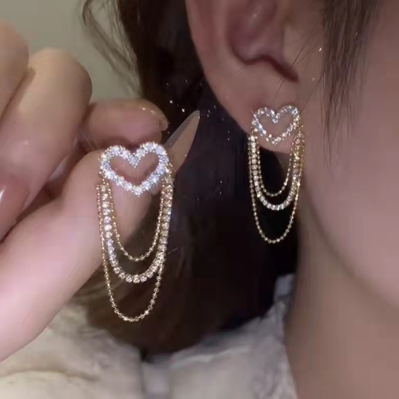 Hollow love super fairy earrings for women spring and summer new niche high-end earrings light luxury earrings tassel retro earrings