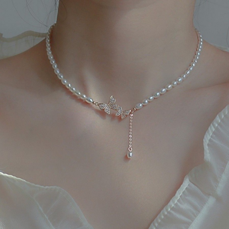 Pearl bow pendant necklace women's light luxury niche design new year's trendy high-end temperament necklace
