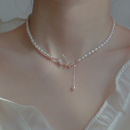 Pearl bow pendant necklace women's light luxury niche design new year's trendy high-end temperament necklace