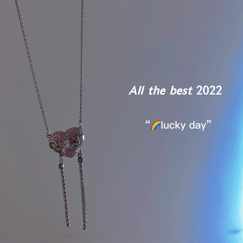 Spring light luxury heavy industry design micro-paved zircon bow love tassel pendant necklace clavicle chain for women