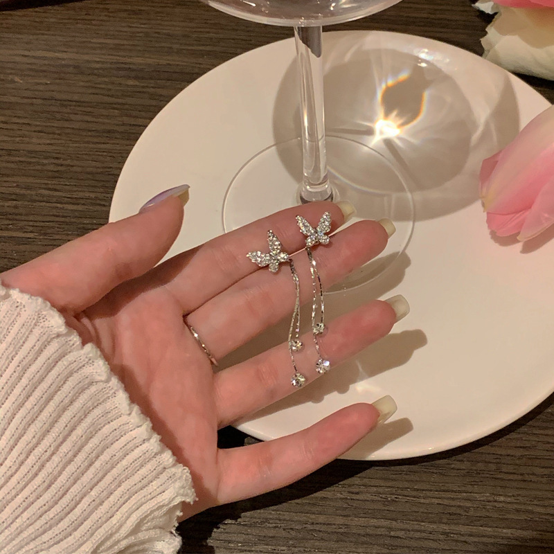 S925 silver needle ins female butterfly tassel earrings new trendy Korean version Internet celebrity temperament round face long earrings earrings