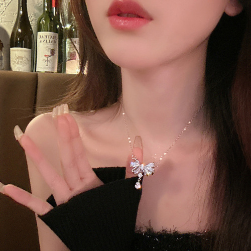 Elf weeps ~ Diamond bow necklace for women, light luxury niche fashion temperament water drop pendant design clavicle chain