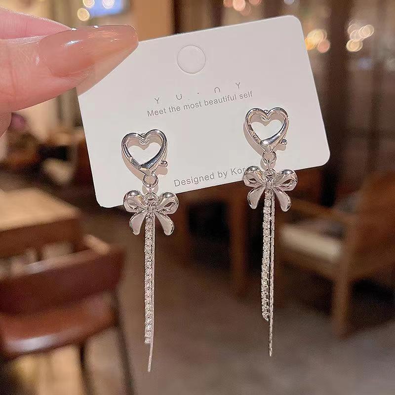 Fashionable and versatile love tassel earrings for women, light luxury niche bow pendant earrings, new internet celebrity earrings