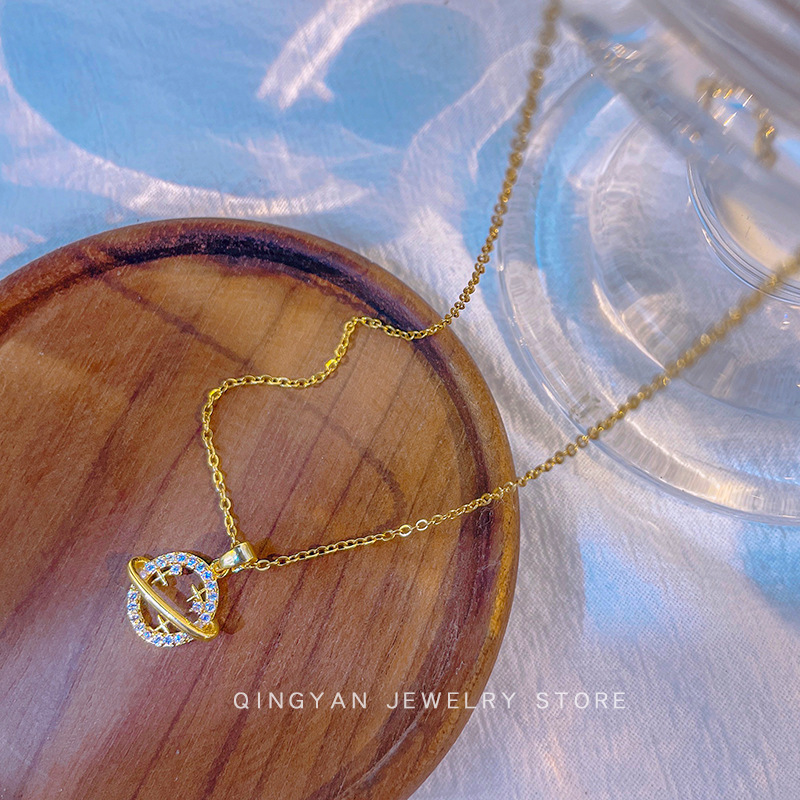 Japanese and Korean style new smiling face little planet pendant titanium steel necklace female super fairy niche clavicle chain high-end versatile jewelry