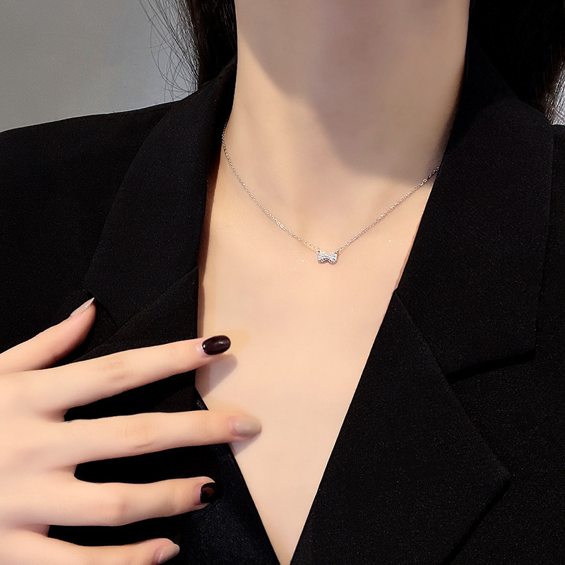 European and American fashion ins niche versatile personalized necklace for women full of diamonds simple compact bow pendant clavicle chain trendy