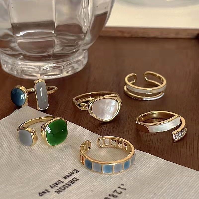 Light luxury ring for women, niche design, versatile and cool Japanese style light luxury European and American ins fruit green ring trend