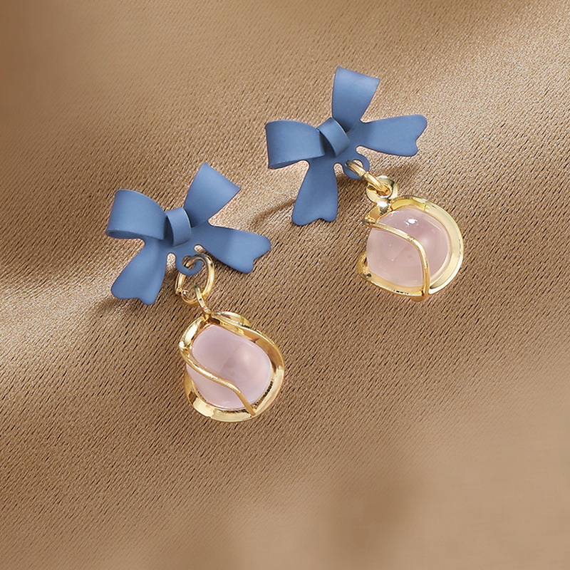 Small fresh cat's eye silver needle earrings, high-end female earrings, Klein blue bow, new trendy niche design