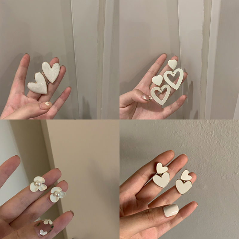 Autumn and winter love milky white big earrings cold wind sweet earrings round face women's earrings new style