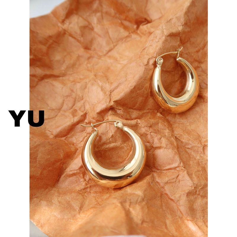 Yuyu jewelry hollow hoop earrings for women, high-end European and American titanium steel design, light luxury ins plain hoop oval hoop
