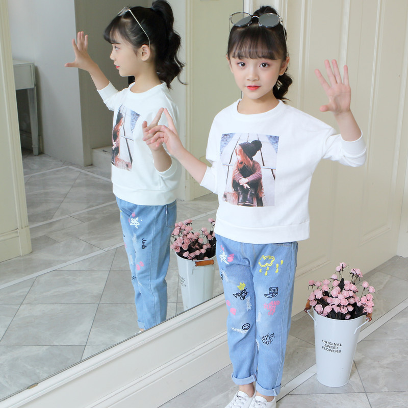 Hot-selling children's clothing autumn new cartoon printed hole girls' jeans children's baby versatile trousers autumn
