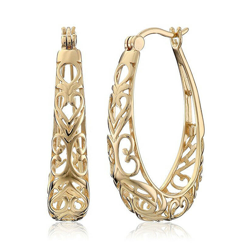 Cross-border hollow flower-shaped two-ring U-shaped earrings with exaggerated personality, retro European and American style jewelry, direct sales from the manufacturer