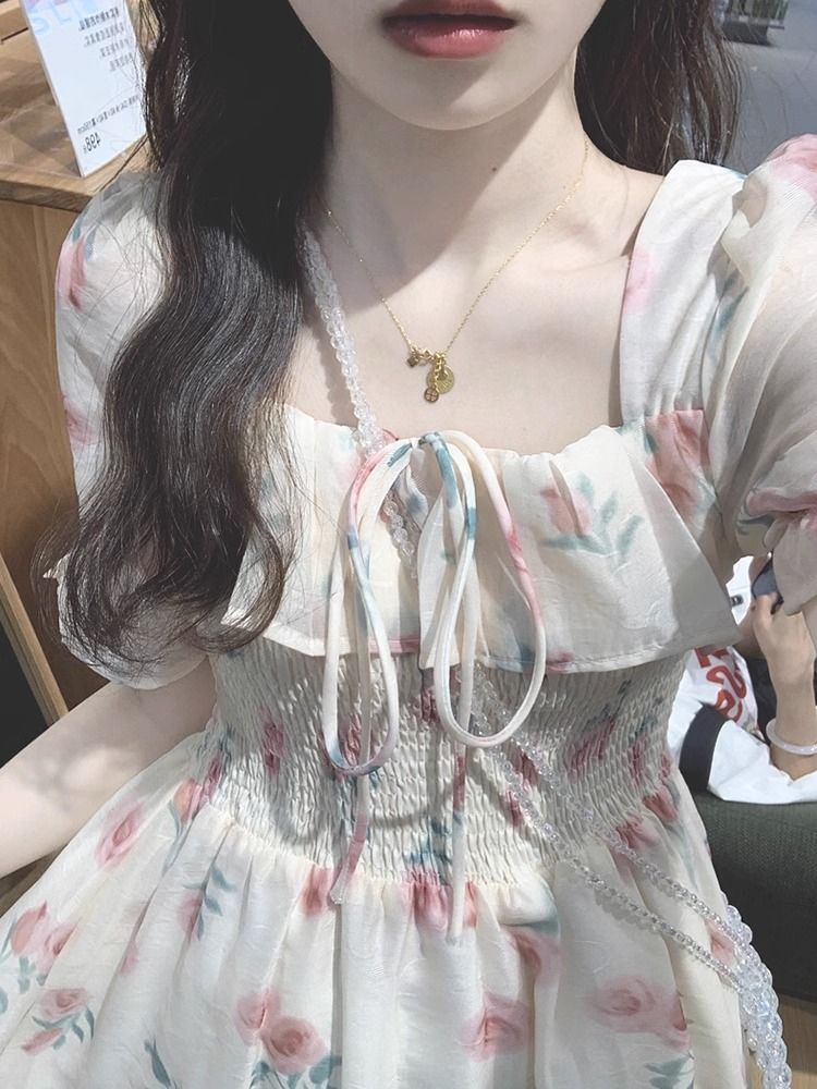 Summer tea break French floral dress puff sleeves forest style first love skirt women's waist-cinching gentle style long skirt