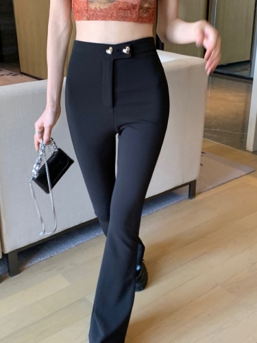 Real shot of black high-waisted solid color pants with metal buckle and zipper slimming slightly flared long-leg pants for women