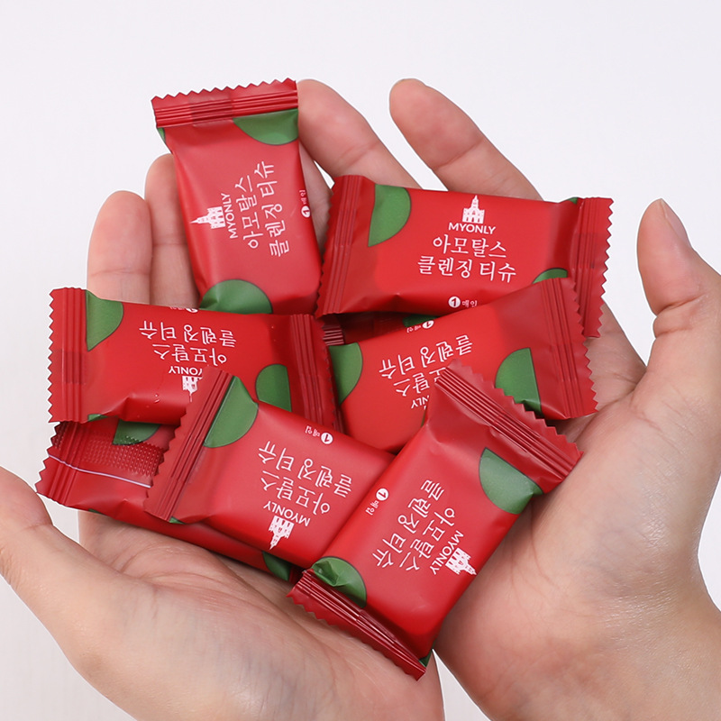 Outdoor disposable thickened compressed towel candy packaging non-woven small square towel travel face towel