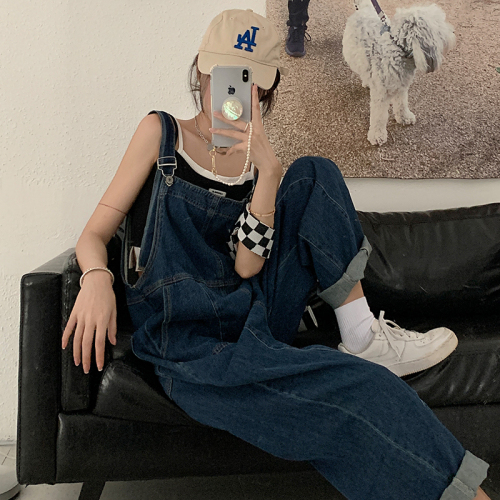 Real shot of high-waisted irregular loose wide-leg denim overalls trousers