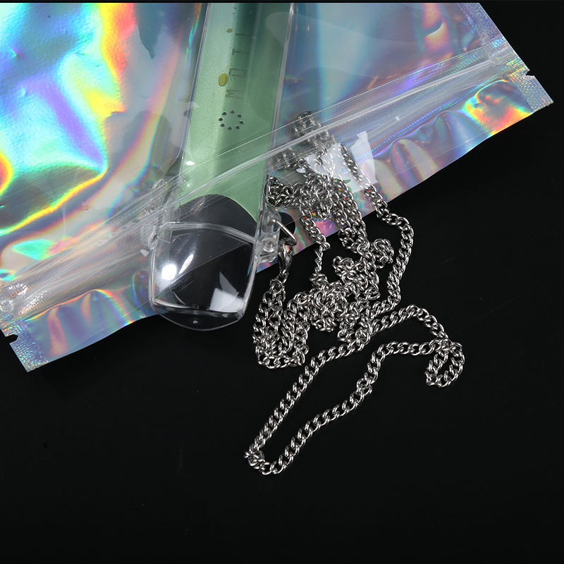Colorful laser packaging ziplock bag, necklace earrings jewelry packaging bag, mobile phone case yin and yang laser bag wholesale