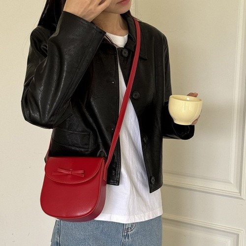 Korean spring and summer women's bags, high-end red niche bags, popular and versatile cross-body bags, fashionable bow saddle bags