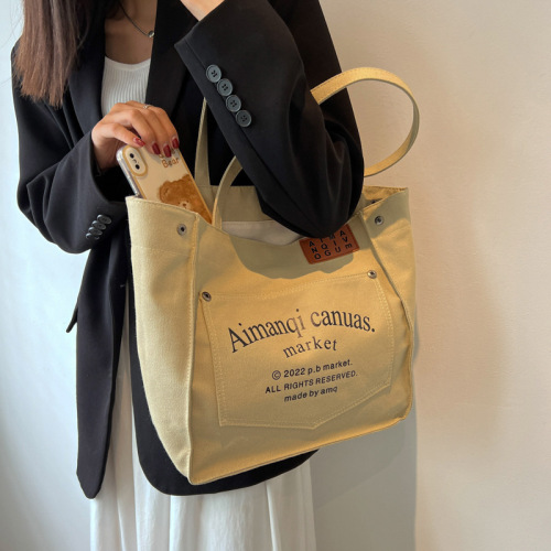 Korean style canvas bag for women 2024 new trendy shoulder armpit bag large capacity portable shopping bag commuter tote bag