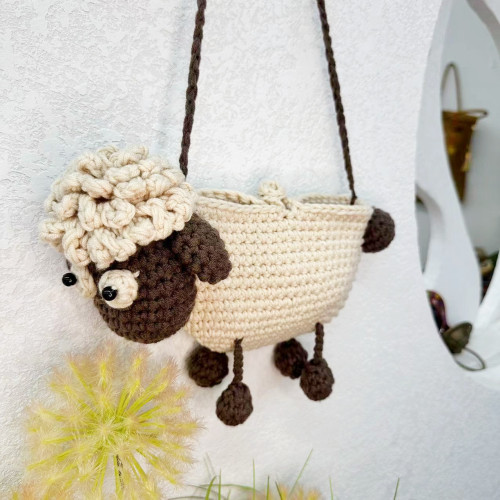 New cute and cute little lamb children's wool knitted mobile phone bag personalized knitted crossbody shoulder crochet bag