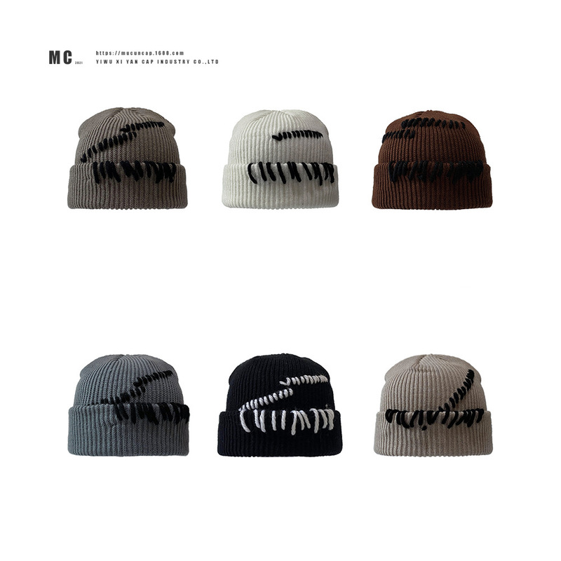 New autumn and winter Korean Dongdaemun hand-stitched knitted hat for women, fashionable warm woolen hat, ear protection hood
