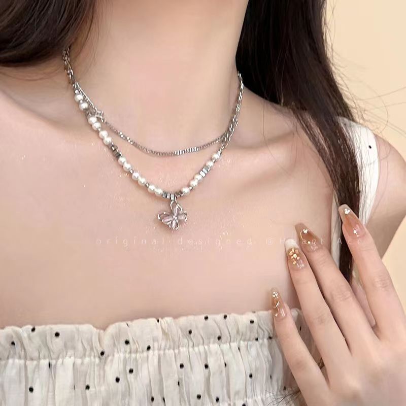 New Cat's Eye Hollow Butterfly Double Pearl Necklace Women's Niche High-Class Clavicle Chain Sweet and Cool Hot Girl Accessories
