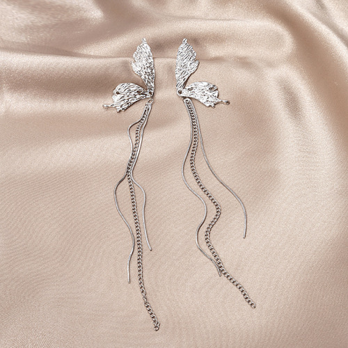 Silver needle personality cool style bumpy texture asymmetric butterfly tassel earrings Hong Kong style liquid butterfly long earrings