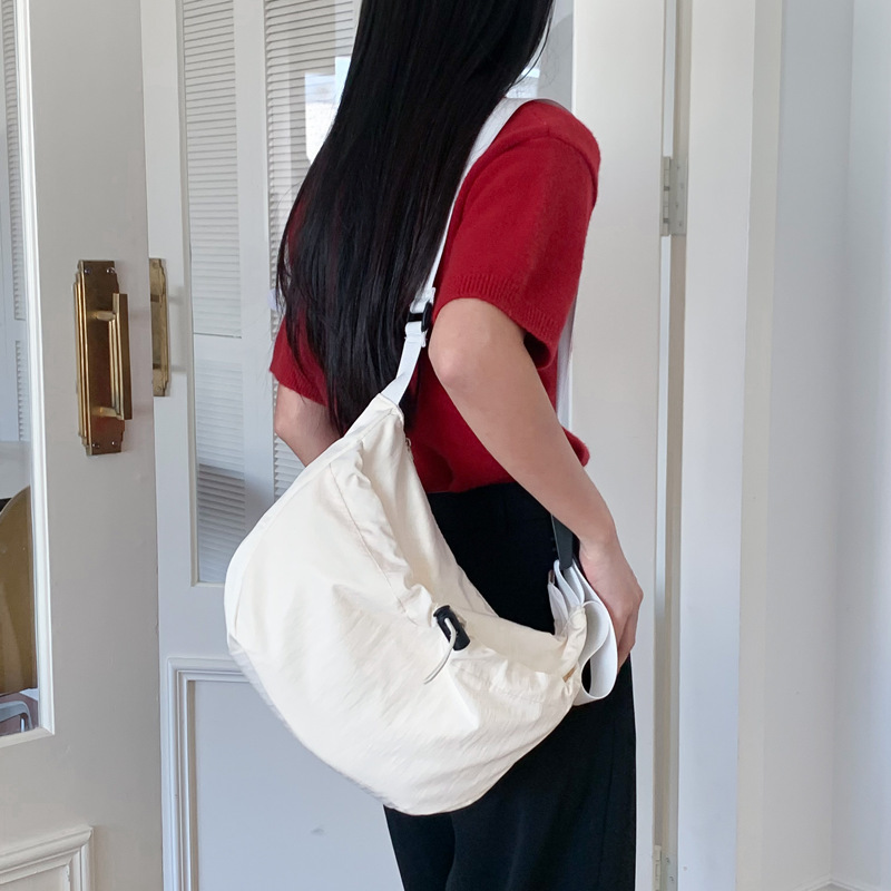 Cool and handsome ins trend fashion versatile nylon bag drawstring compartment zipper bag women's crossbody bag