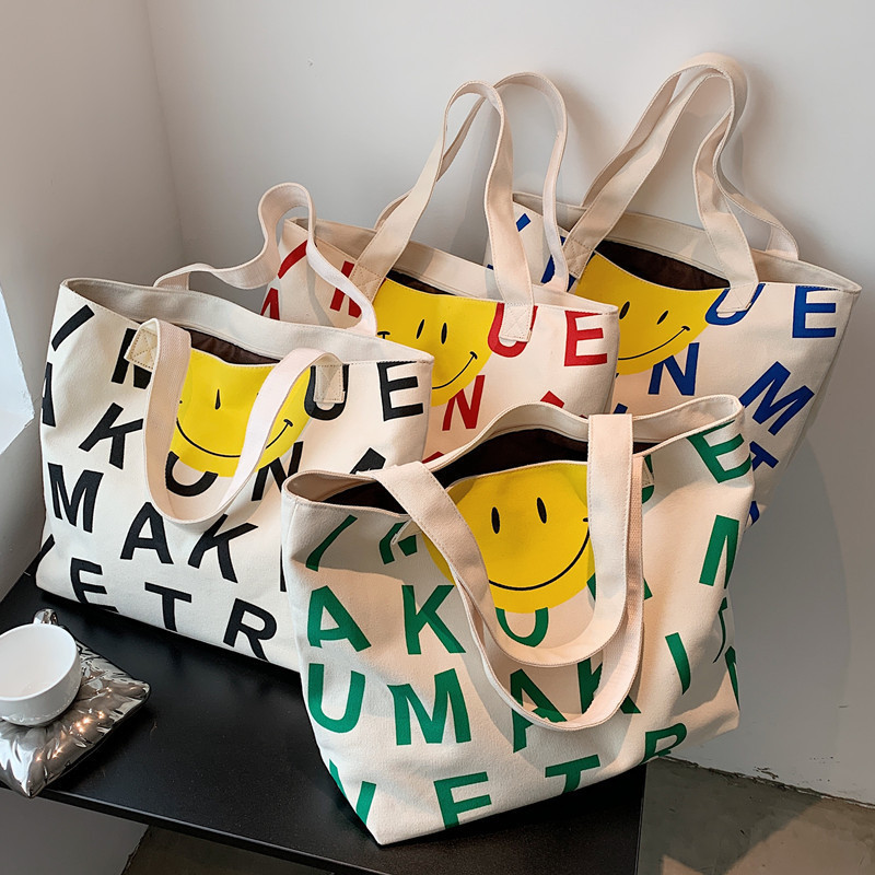 New women's bag Dongdaemun South Korea cartoon casual letter smiley canvas bag hand shoulder bag tote bag