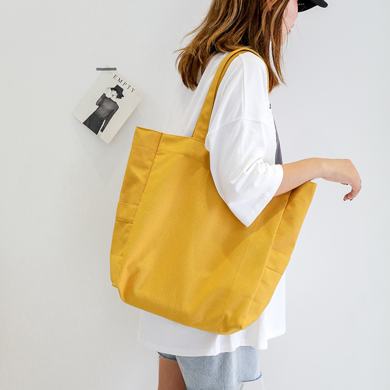 Korean version of foreign trade solid color extra large capacity shoulder tote bag Japanese literary and artistic versatile portable ins ladies canvas bag