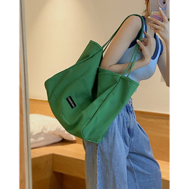 Bag women's new Korean canvas bag large capacity candy color commuting student niche shoulder