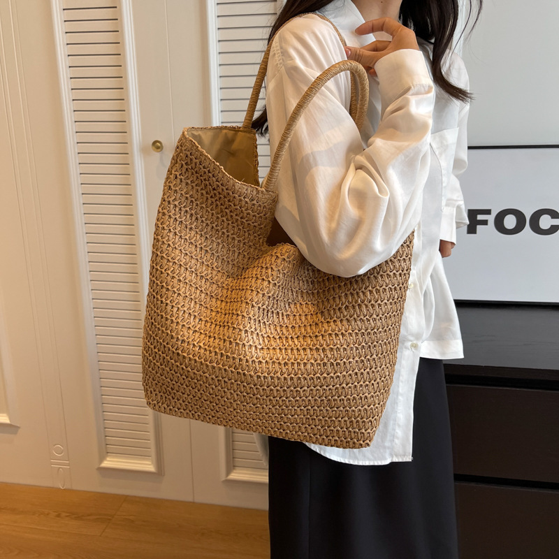 Woven straw bag women's large capacity 2024 new summer versatile shoulder bag simple commuter seaside beach bag