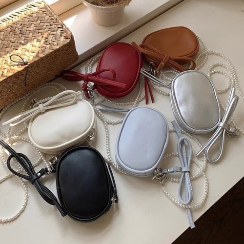 Design niche bag crossbody ultra small mini lipstick bag concave shape earphone bag bow oval egg bag