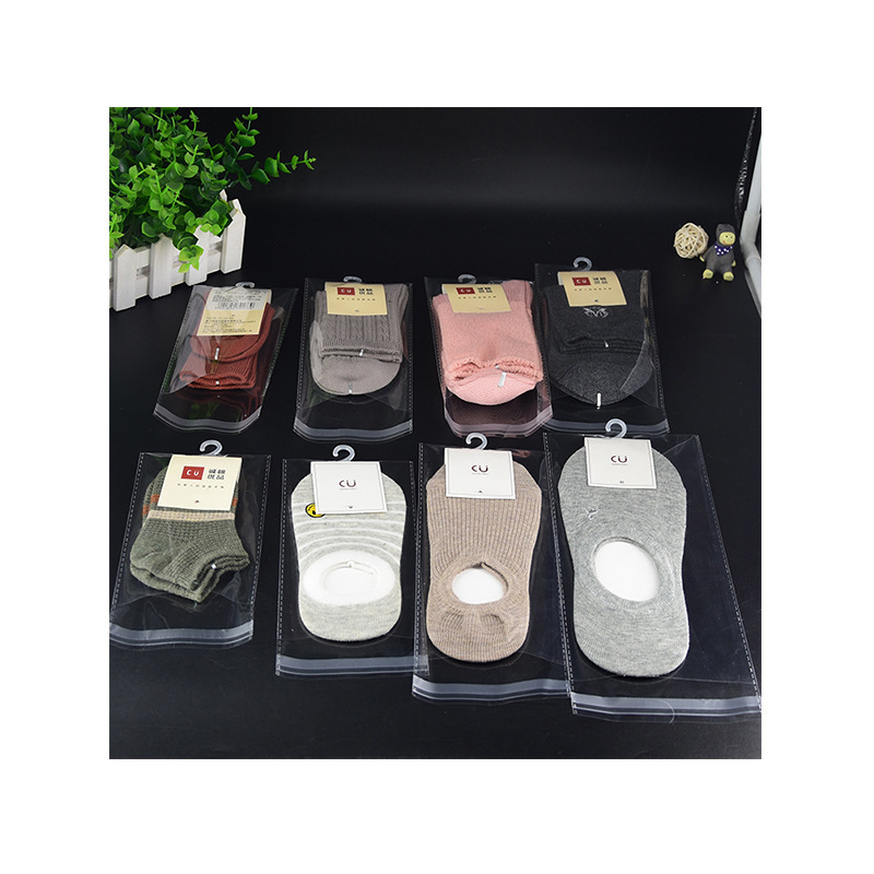 OPP self-adhesive bag sock packaging bag self-adhesive plastic bag transparent bag wholesale semi-circle hanging hole plastic bag